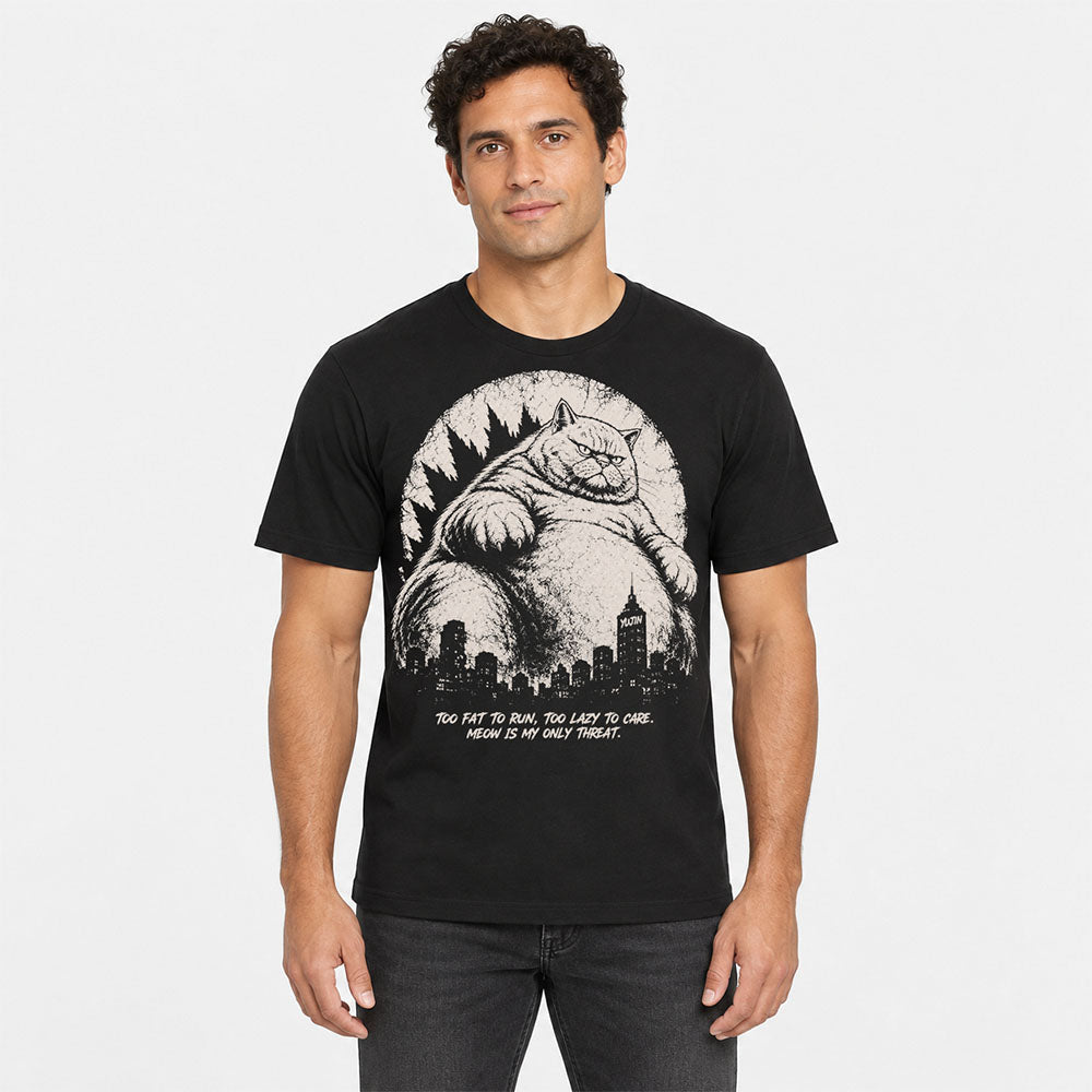 Male model wearing the Black Lazy Colossus Cat T-Shirt, front view