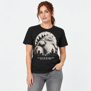 Female model wearing the Black Lazy Colossus Cat T-Shirt, front view