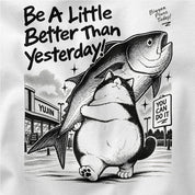 Closeup of Bigger Plans cat carrying a fish artwork on a White T-shirt