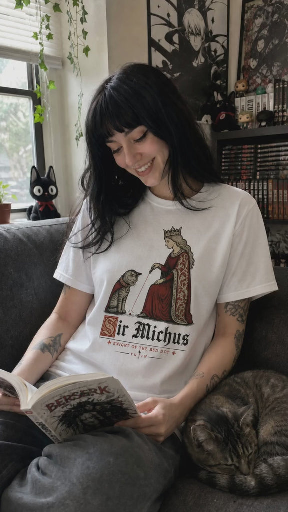 Sir Michus Cat T-Shirt customer wearing the white shirt while reading manga with her cat