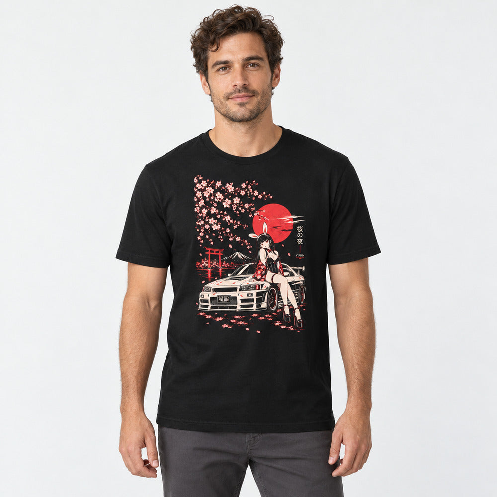 Male model wearing the Sakura Night Car T-Shirt in Black, showing the cherry blossom, red moon and car artwork