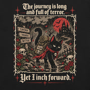 Close-up of Yet I Inch Forward Cat T-Shirt artwork on Black