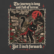 Close-up of Yet I Inch Forward Cat T-Shirt artwork on Dark Grey