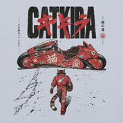 Close-up of Catkira Nine Lives One Road Cat T-Shirt artwork on Light Blue
