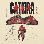 Close-up of Catkira Nine Lives One Road Cat T-Shirt artwork on Natural